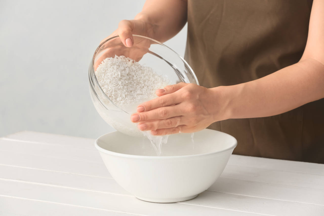 A woman preparing rice water for hair