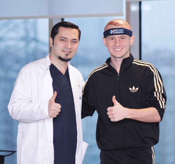 Dr Balwi with a patient who had a positive experience with Elithair