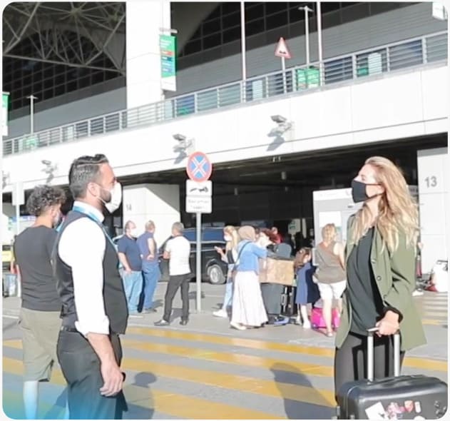 selina is greeted at the airport