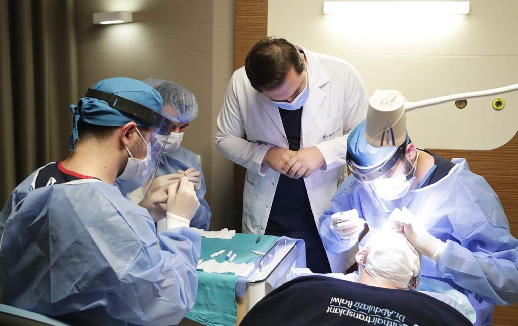Medical team supervised by Dr. Balwi during a hair transplant operation at Elithair