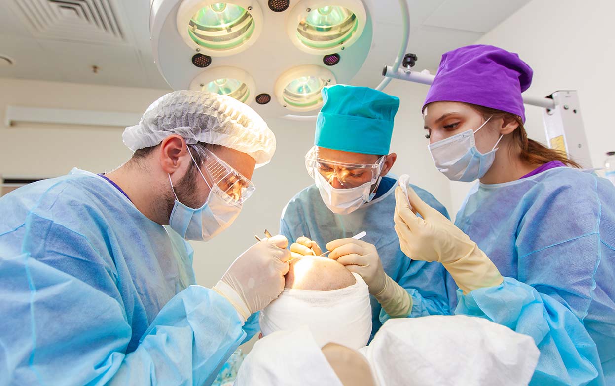 Elithair's medical team performing a percutaneous hair transplant surgery