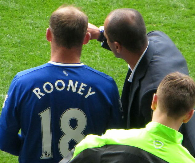 Back view of Wayne Rooney balding celebrity with hair transplant