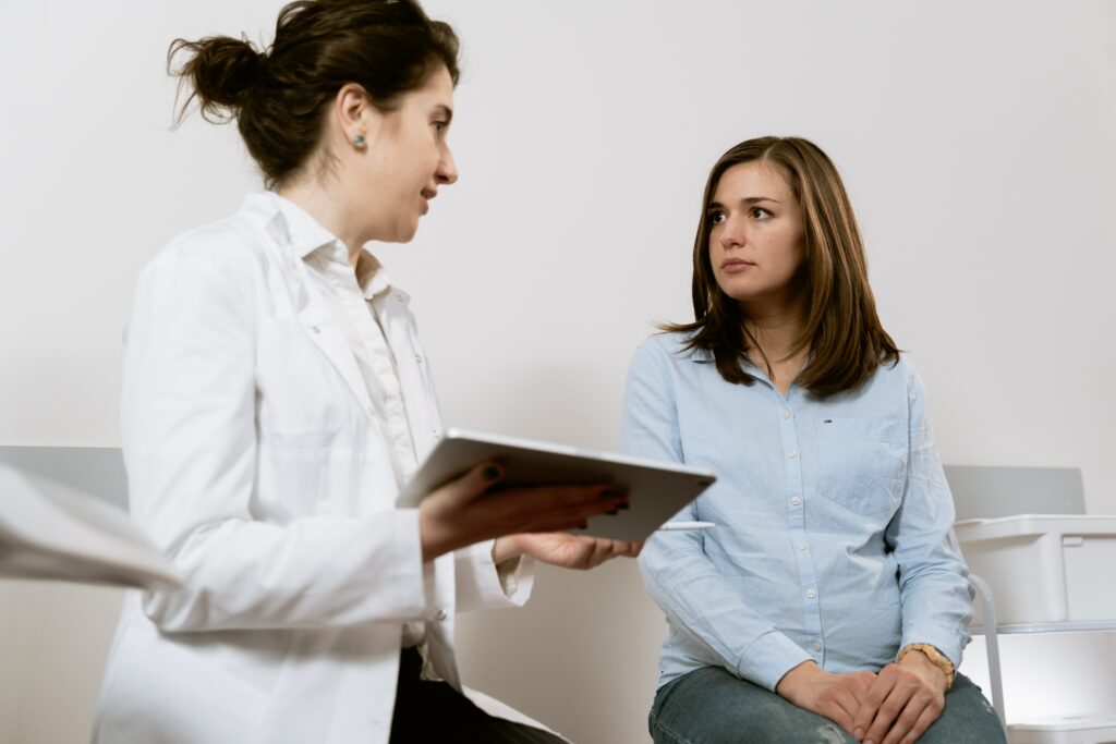 Trichologist doctor consulting with patient