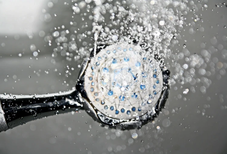 water sprinkling out of a shower head