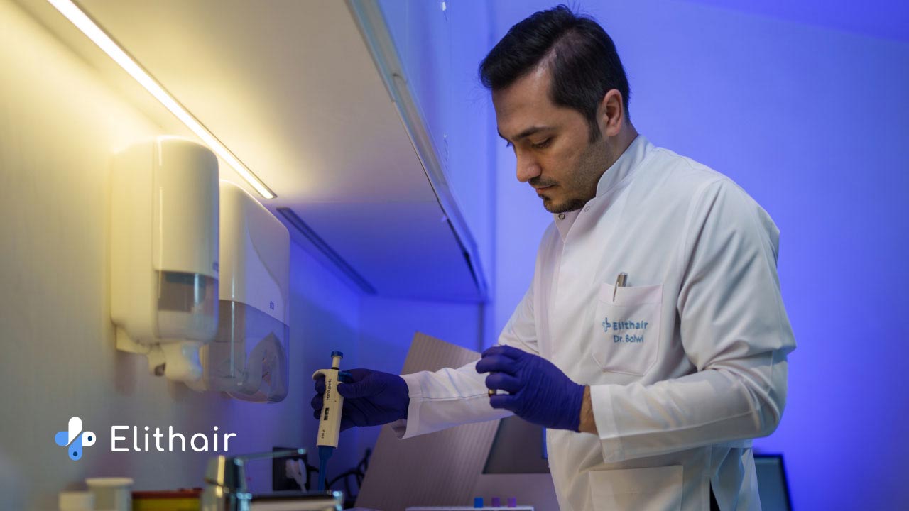 Dr. Balwi in the laboratory working on the Elithair studies