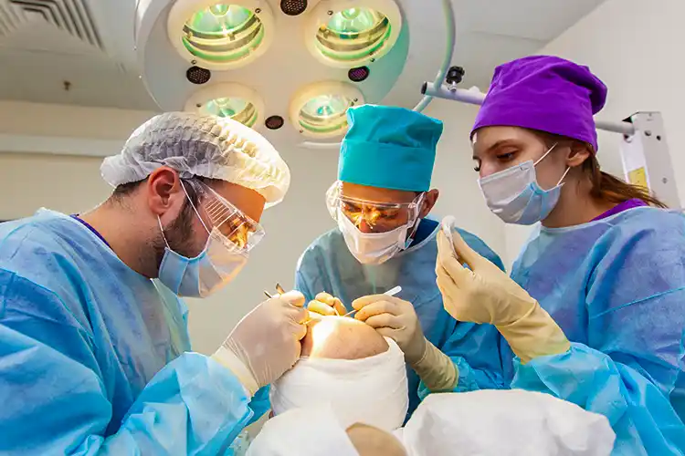 A patient undergoing a hair transplant operation.