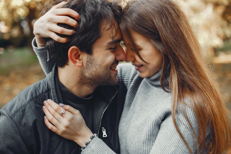 A man and woman in a loving embrace.