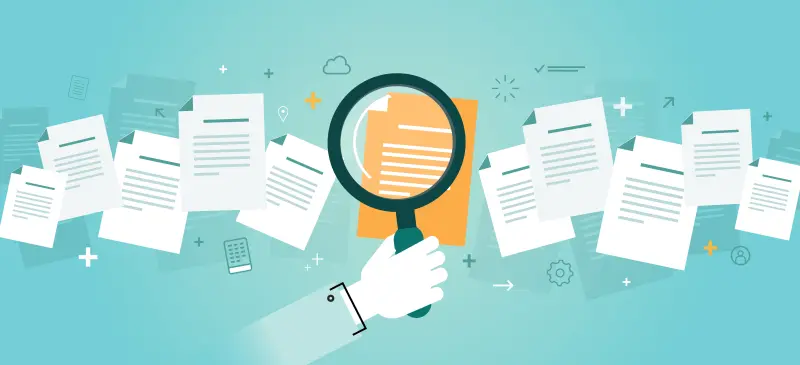 An illustration of a hand holding a magnifying glass over various documents
