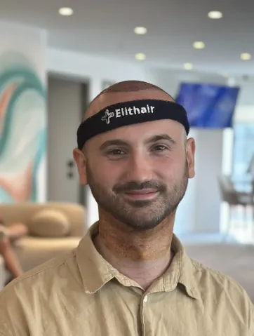 Pic shows a Patient with Elithair headband smiling at the camera at the Elit Klinik